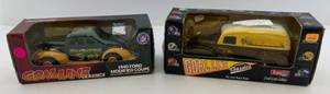 lot 41 image: Two  Ertl Collectibles ( Goal Line Classics ) Die- Cast Metal Banks 1 ( Minnesota Vikings ) 1 ( Green Bay Packers )