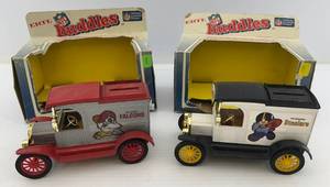 lot 43 image: Two 1983 Ertl Collectibles NFL Huddles Die-Cast Banks 1 1913 Ford Model T Delivery Truck ( Atlanta Falcons )  1 1913 Model T Van ( Pittsburgh Steelers ) ( Open In Original Boxes )