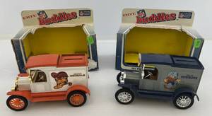 lot 44 image: Two 1983 Ertl Collectibles NFL Huddles Die-Cast Banks 1 1913 Ford Model T Delivery Truck ( Cincinnati Bengals )  1 1913 Model T Van ( Dallas Cowboys ) ( Open In Original Boxes )