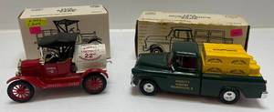 lot 50 image: Two  Ertl Collectibles Die- Cast Metal Banks With Liquor Advertisement 1 ( Angelos Liquors ) 1955 Pickup Truck 1 ( Jim Beam Collectors 22nd Anniversary ) 1918 Barrel Truck