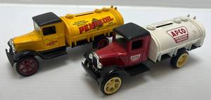 lot 55 image: Two  Ertl Collectibles Die- Cast Metal Banks ( No Boxes )  With Motor Oil Advertisement 1 ( APCO ) Tanker Truck 1 ( Pennzoil ) Tanker Truck