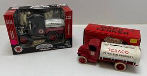 lot 89 image: Two Collectible Die-Cast Metal Banks&nbsp 1 Gearbox Limited Edition ( Texaco ) 1912 Ford Oil Tanker 1 Ertl ( Texaco ) 1926 Mack Tanker