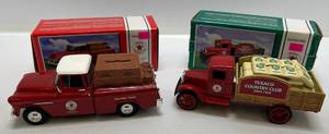 lot 94 image: Two 2001 Ertl Collectibles Die-Cast Metal Banks&nbsp 1 ( Texaco ) 1934 Hawkeye Truck 1 ( Texaco ) 1955 Chevy Cameo Pick-Up Truck