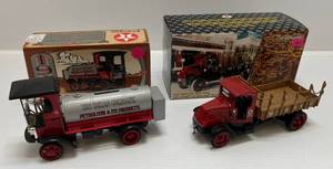 lot 97 image: Two Ertl Collectibles Die-Cast Metal Banks&nbsp 1 1995 ( Texaco ) Tanker 1 2001 ( Texaco ) 1918 Mack AC Bulldog Flatbed Truck