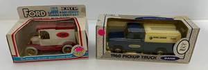 lot 125 image: Two Ertl Collectibles Die-Cast Metal Banks 1 1996 ( Black &amp Decker) 1960 Pickup Truck 1 1988 (Our Own Hardware ) 1913 Model T Delivery
