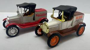 lot 144 image: Two Ertl Collectibles Die-Cast Metal Banks 1 ( Big Bear Family Centers ) Ford Model T 1 ( Ben Franklin ) 1918 Model T Runabout