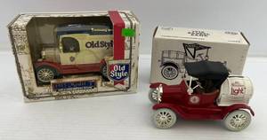 lot 159 image: Two Ertl Collectibles Die-Cast Metal Banks 1 1995 ( Old Style ) 1913 Model T 1 1989 ( Old Milwaukee Light ) 1918 Barrel Truck
