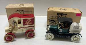 lot 165 image: Two Ertl Collectibles Die-Cast Metal Banks 1 ( The Jackson Brewery ) 1905 Delivery Car 1 1989 (  Dixie Beer ) 1918 Barrel