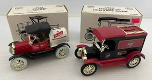 lot 167 image: Two Ertl Collectibles Die-Cast Metal Banks 1 1989  ( Leinenkugels ) 1918 Barrel Truck 1 1994 ( Leinenkugels ) 1913 Model T Delivery