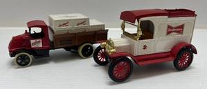 lot 174 image: Two Ertl Collectibles Die-Cast Metal Banks ( No Boxes ) 1  (  Anheuser Busch Budweiser ) 1913 Model T Van 1 (  Leinenkugels )  1928 Bulldog