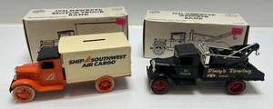 lot 201 image: Two Ertl Collectibles Die-Cast Metal Banks 1 1990 ( Southwest Airlines ) 1931 Hawkeye Motor Truck 1 1991 ( Pinkys Towing ) 1931 Hawkeye Wrecker