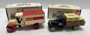 lot 211 image: Two Ertl Collectibles Die-Cast Metal Banks 1 1990 ( Bell ) 1931 Hawkeye Crate 1 1993 ( Snyder Drug ) 1925 Kenworth Truck