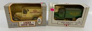 lot 212 image: Two Ertl Collectibles Die-Cast Metal Banks 1 1991  ( IGA Hometown Proud ) 1923 Truck 1 1992 ( 75th Anniversary Earl E. May Seed &amp Nursery ) 1931 Delivery