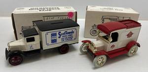 lot 214 image: Two Ertl Collectibles Die-Cast Metal Banks 1 1990  ( Scott Paper ) 1931 Hawkeye Motor Truck 1 1992 ( Lipton Tea )  1913 Model T Delivery