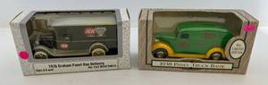 lot 215 image: Two Ertl Collectibles Die-Cast Metal Banks 1 1993 ( HWI Fort Wayne, Ind. )1938 Panel Truck 1 2001 ( IGA ) 1926 Graham Panel Van Delivery