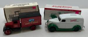 lot 216 image: Two Collectibles Die-Cast Metal Banks ( NIB ) 1 Ertl ( Radio FLyer ) 1931 Hawkeye Motor Truck 1 RC2 ( Krispy Kreme ) 1938 Chevolet Delivery Truck