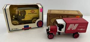 lot 218 image: Two Ertl Collectibles Die-Cast Metal Banks 1 1992 ( IGA ) 1912 Open Cab 1 1998 ( National Linen Services ) 1925 Kenworth