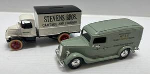 lot 224 image: Two Ertl Collectibles Die-Cast Metal Banks ( No Boxes ) 1 ( Minneapolis Star ) 1933 Ford Panel Truck 1 ( Stevens Bros Cartage And Storage ) 1926 Bulldog