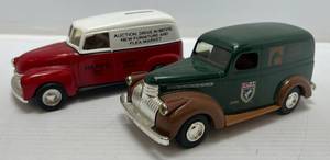 lot 239 image: Two Ertl Collectibles Die-Cast Metal Banks ( No Boxes ) 1 ( Ducks Unlimited Inc. ) 1946 Suburban 1 ( Haars ) Limited Edition GMC Panel