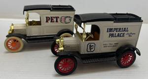lot 246 image: Two Ertl Collectibles Die-Cast Metal Banks  ( No Boxes )1 ( PET MILK ) 1913 Model T Van 1 ( Imperial Palace Las Vegas ) 1913 Model T Van