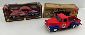 lot 265 image: Two Ertl Collectibles Die-Cast Metal Banks 1 1998 ( Commercial Fueling Network ) 1956 Ford Pickup 1 1999 ( Mills Motors ) 1950 Oldsmobile Rocket 88
