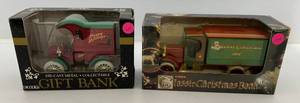 lot 275 image: Two Ertl Collectibles Die-Cast Metal Banks 1 1990 ( Happy Holidays ) Gift Bank 1 1994 ( Merry Christmas ) 1925 Kenworth Delivery Truck