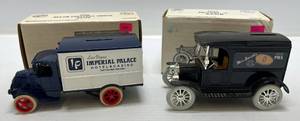 lot 302 image: Two 1989 Ertl Collectibles Die-Cast Metal Banks 1 ( Mr. Smiths ) 1917 Model T 1 ( Las Vegas Imperial Palace Hotel &amp Casino )  1926 Mack Delivery Truck