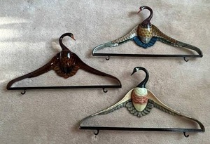 lot 30 image: Collection of 3 Colorful Bird Designed Coat Hangers