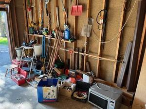 lot 50 image: Huge Garage Items Lot - Aladdin Kerosene Heater, Ice Fishing, Tree Pruner, Garden Supplies, Tools, Scotts Spreader, and More