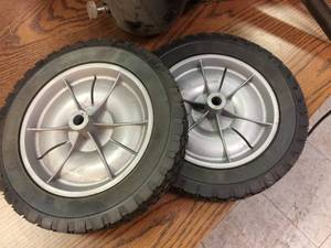 lot 128 image: Pair Hard Rubber 10 Utility Wheels