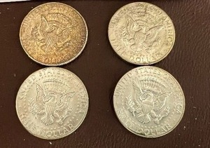 LOT OF 4 SILVER HALF DOLLARS