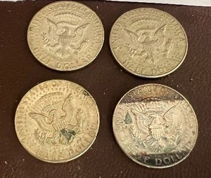 LOT OF 4 SILVER HALF DOLLARS
