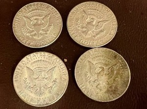 LOT OF 4 SILVER HALF DOLLARS