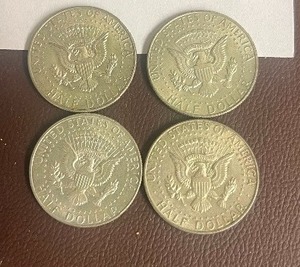 LOT OF 4 SILVER HALF DOLLARS