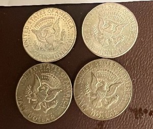 LOT OF 4 SILVER HALF DOLLARS