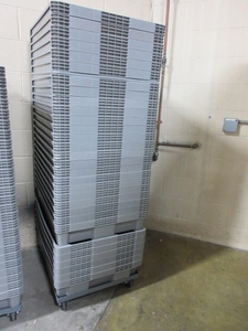 lot 256 image: ORBIS STACKABLE GREY TOTES ON WHEELED TRANSPORT DOLLY