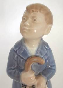 lot 74 image: Royal Copenhagen Danish Porcelain Boy with Umbrella 4526