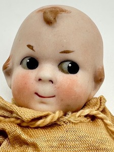 lot 97 image: Antique Bisque German Kewpie Type Doll