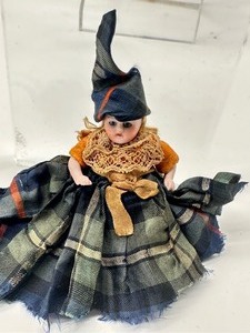 lot 13 image: Antique Miniature Bisque Doll