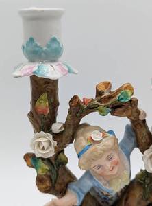 lot 21 image: Antique Fairing Porcelain Candleholder