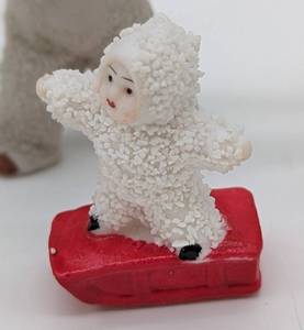 lot 235 image: Antique Bisque Snow Baby Figurines