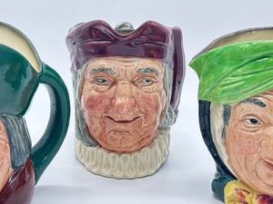 lot 59 image: Royal Doulton Toby Mug Sairey Gump, Royal Doulton Toby Mug Simon Cellarer and Toby Philpots