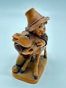 lot 52 image: Vintage Carved Wooden Figurine of an Adorable Boy and His Donkey