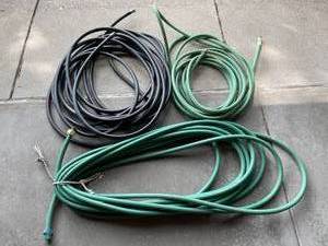 lot 232 image: Three Garden Hoses