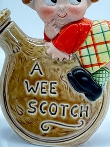 lot 92 image: Vintage A Wee Scotch Nipper Bottle