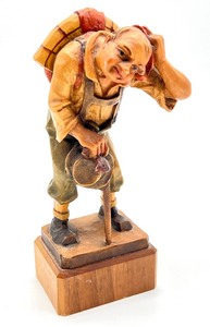 lot 156 image: Vintage Anri Wooden Carved Figurine German Hiker and Woman with a Cat