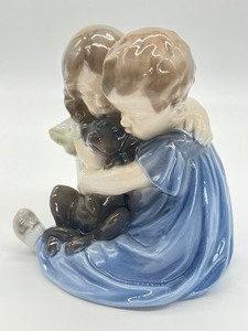 lot 167 image: Large Royal Copenhagen Figurine 707 Children Hugging a Dog