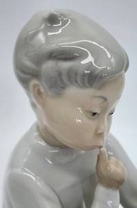 lot 332 image: Lladro Boy with Dog Porcelain Figurine, Number 4522