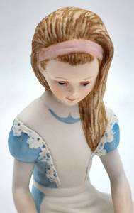 lot 343 image: Cybis Alice in Wonderland Bisque Porcelain Figure - Number 034 Flights of Fantasy Collection