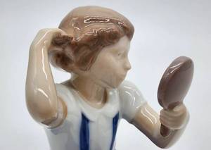 lot 347 image: Bing and Grndahl Girl with Comb & Mirror Figurine Number 2318